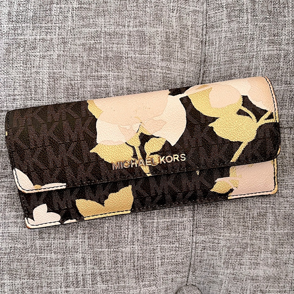 Michael Kors slim signature wallet w/floral design.